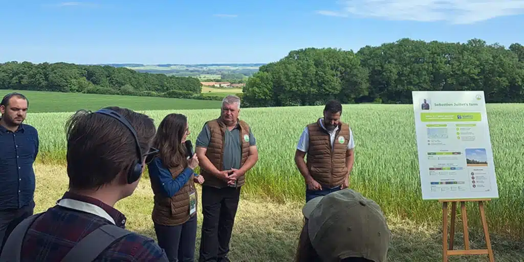 Agronomists gather for a field demonstration during the Invivo SAI Conference, supporting regenerative agriculture practices.